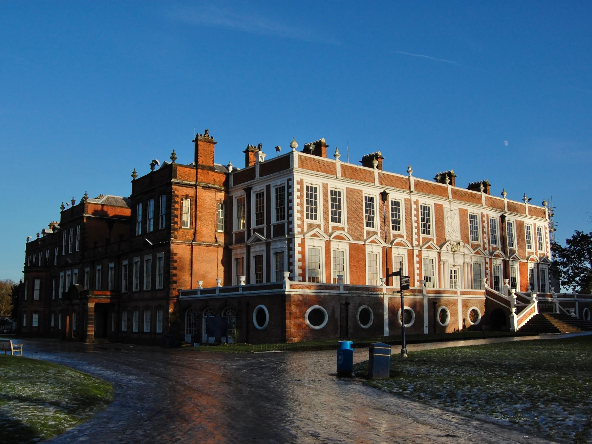 Photograph of Croxteth Hall in the frost under a blue sky