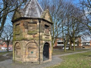 A photo of Wavertree Lock-up, a one-room, octagonal, sandstone building